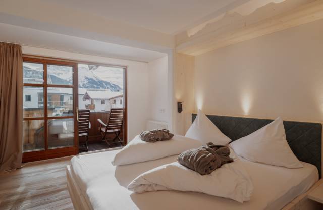Gemütliches Hotelzimmer mit Balkon im Tirolerhof.